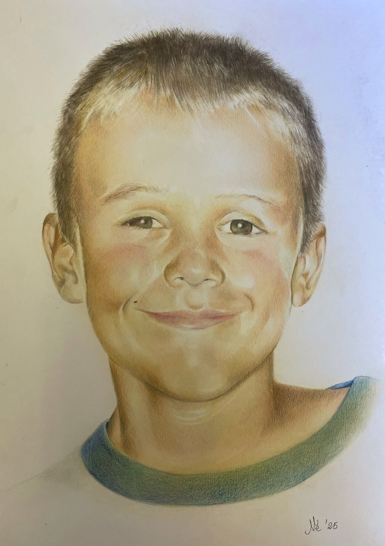 Colored pencil portrait of a smiling young boy.